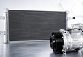 Truck air conditioning condenser and compressor for heavy vehicles
