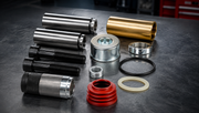 Truck brake caliper repair kit with pins, sleeves, seals and bushings